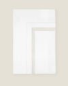 Tre Righe flat sheet white/sage folded.